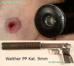 Выстрел в упор из пистолета Walther PP с глушителем